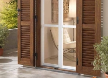 Modello a stecche ovali per porta finestra. Colore renwood 1SR
